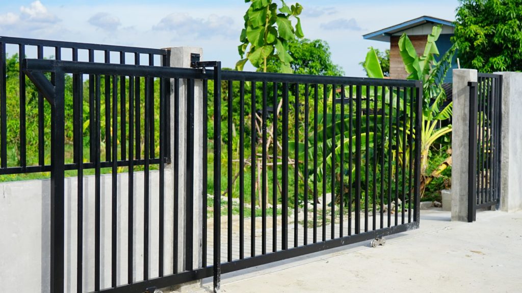 An automatic residential gate in black 
